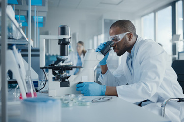 iStock-1293772875-lab-research-scientist-microscope