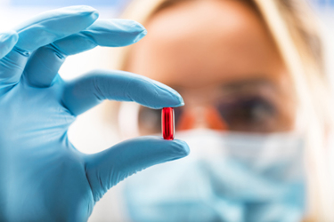 iStock-843765220-pill-glove