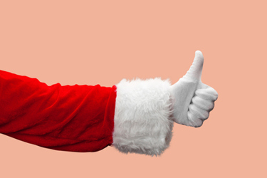 Santa Claus thumbs up gesture-GettyImages-1356999402