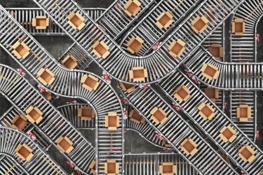 Conveyors with cardboard boxes-GettyImages-1160031067