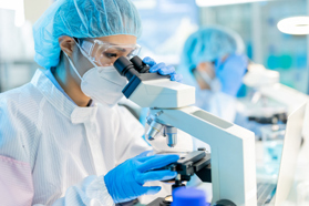 GettyImages-1288978528 Scientist Using Microscope In Lab
