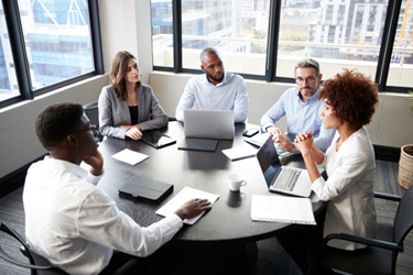 GettyImages-1146473276-team-collaboration-partnership-discussion