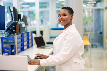 GettyImages-1371703090-lab-scientist-happy
