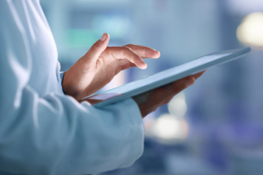 Scientist Using Tablet GettyImages-1413603540