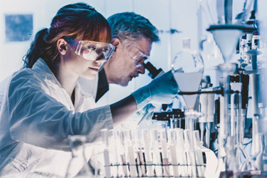 iStock-1296757866-research-lab-flask-microscope