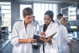 scientists chemists laboratory-GettyImages-1055312560