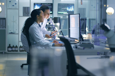 Medical scientists analyzing research-GettyImages-1413600685