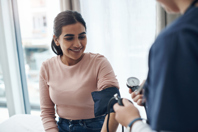 GettyImages-1325251634-doctor-patient-blood-pressure-visit