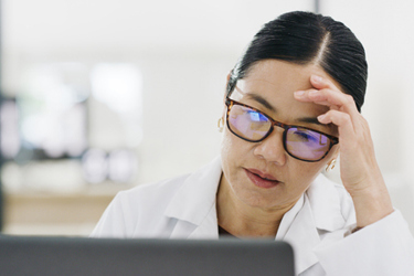 Headache stress scientist-GettyImages-1464665538