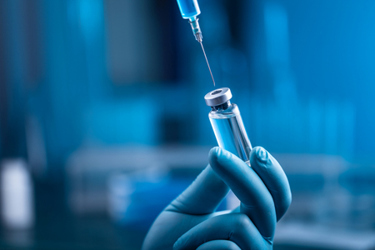 bottle and syringe serum drug-GettyImages-1337025915 bottle and syringe serum drug-GettyImages-1337025915