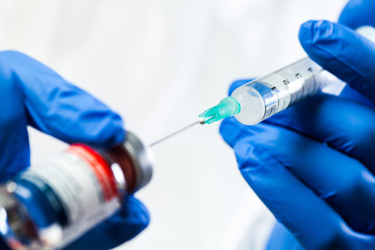 Needle-syringe-GettyImages-1360744905