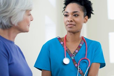 nurse comforting patient