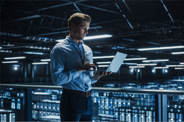 GettyImages-1336251027 IT Specialist Using Laptop Computer In Data Center
