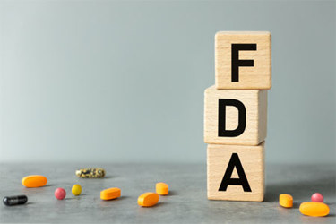 GettyImages-1509265795-blocks-FDA-pills-pharma-clinical
