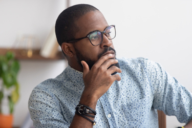 businessman pondering business strategy istock 1143790714 businessman pondering business strategy istock 1143790714