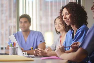 Medical-staff-meeting-GettyImages-1385403682
