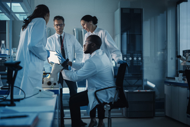 GettyImages-1293773576-lab-team-collaboration-planning-research