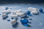 GettyImages-1832921718-pills-medicine-blue-background