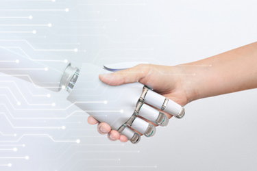 Robotic and human handshake-GettyImages-2158226298 Robotic and human handshake-GettyImages-2158226298