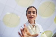 Scientist With Petri Dishes GettyImages-893884982