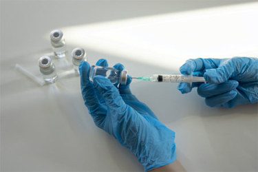 GettyImages-2098817477-vaccine-needle-syringe-gloved-hands-laboratory GettyImages-2098817477-vaccine-needle-syringe-gloved-hands-laboratory