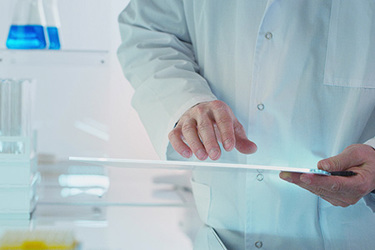 Scientist laboratory ipad iStock-1207515232