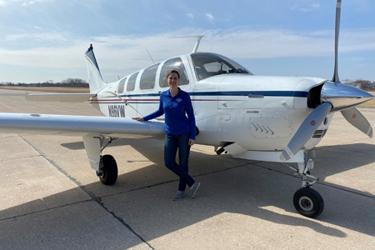Lindsey with Andy W. plane_Mt. Hawley_March 2021