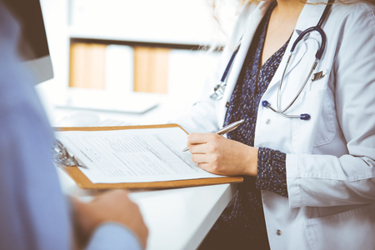 GettyImages-1303135790-patient-doctor GettyImages-1303135790-patient-doctor