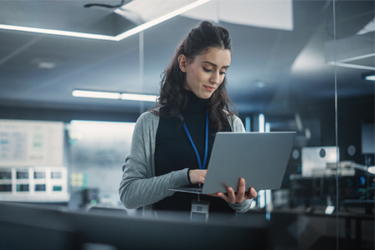 GettyImages-1489414892 Technological Software Engineering Department Manager Using A Laptop