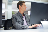 GettyImages-1455543808 IT worker at computer